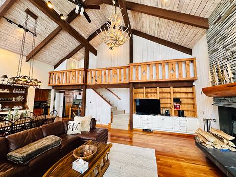 74 North Brookwood Rd Private Home Rental living room with high ceiling and chandelier
